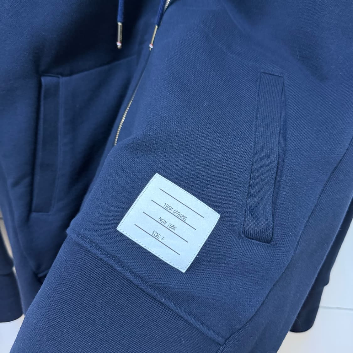 A / 7 (110-115) 톰브라운 사선완장 후드집업 네이비 상품이미지4