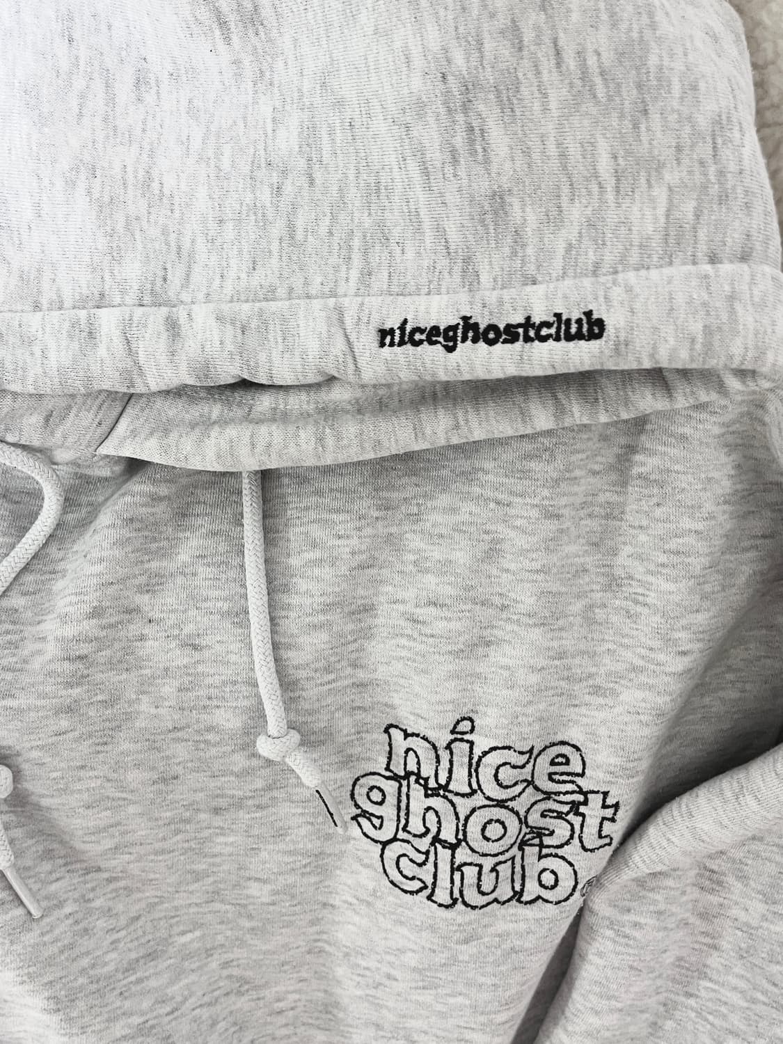 나이스고스트클럽 빅로고 백멜란지 후드티 상품이미지1