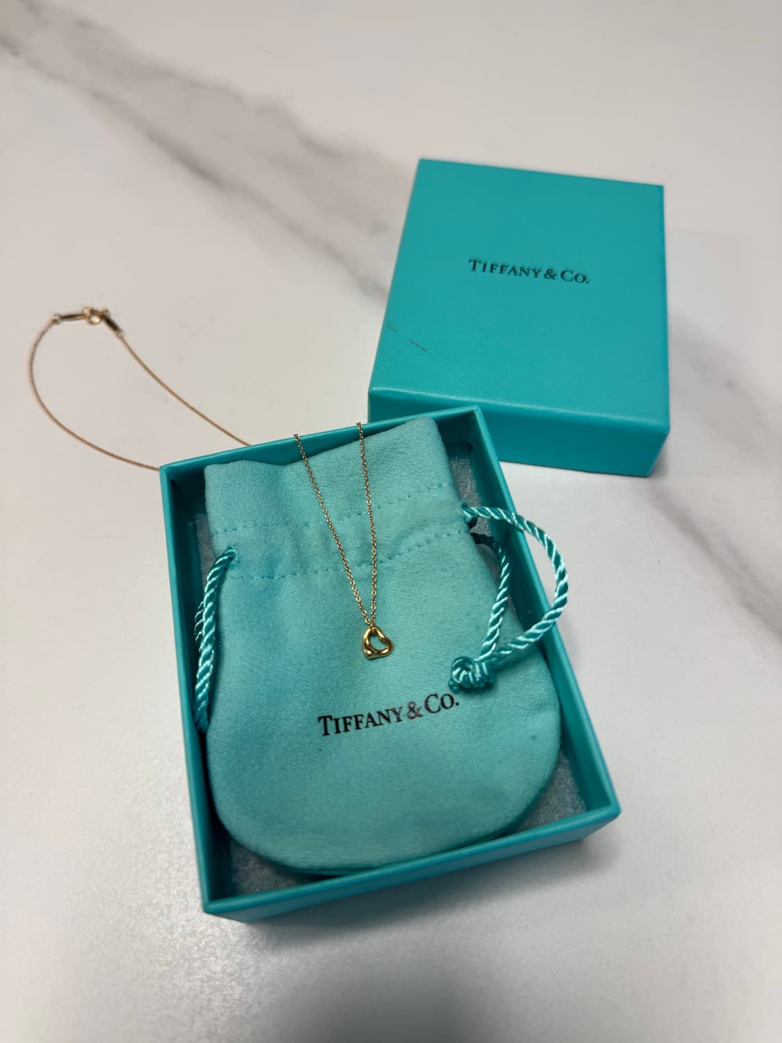 티파니앤코 오픈하트 미니 7mm 18k 옐로우골드 상품이미지1