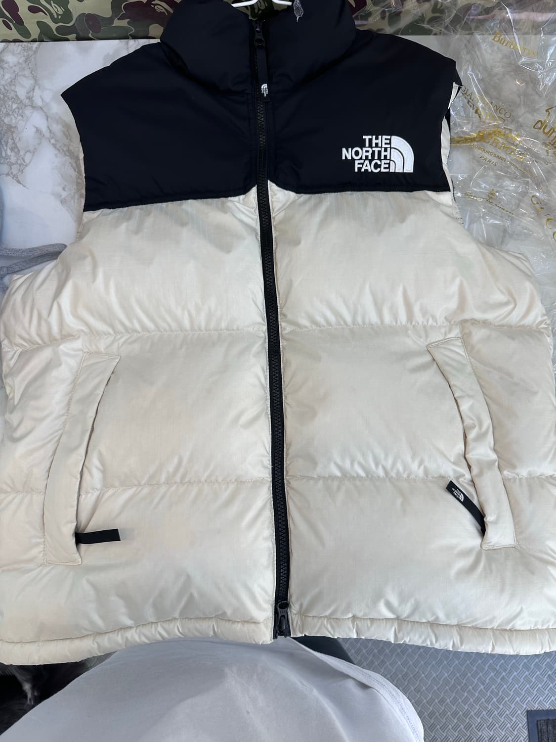 노스페이스 화이트 라벨 노벨티 눕시 다운 베스트 크림95M 상품이미지1