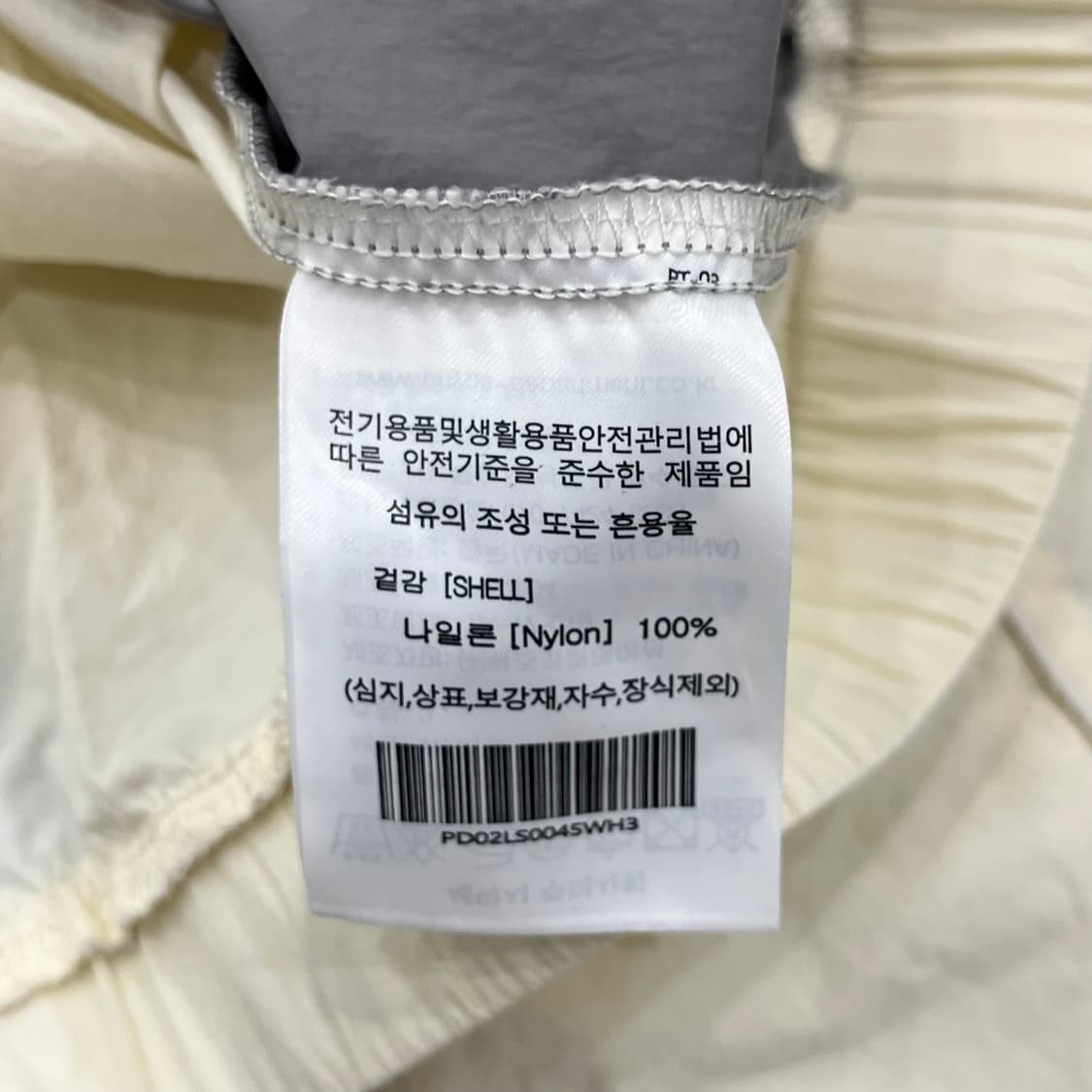 L 피지컬 디파트먼트 테일로고 나일론 웜업 롱슬리브 상품이미지5