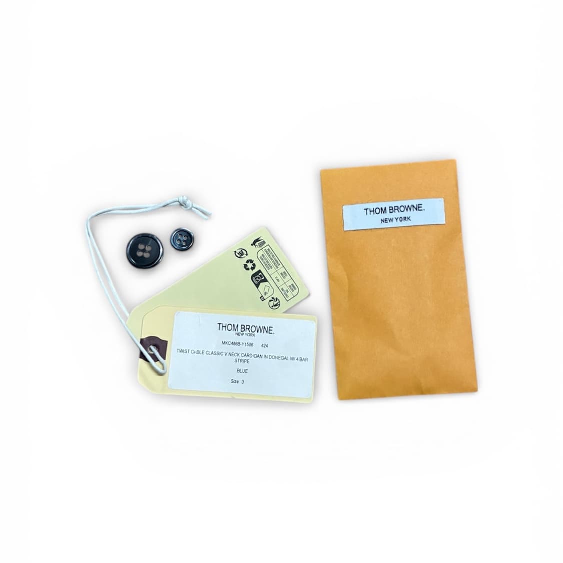 [새상품] 톰브라운 도네갈 트위스트 케이블 사선 클래식 브이넥 가디건 3 상품이미지6