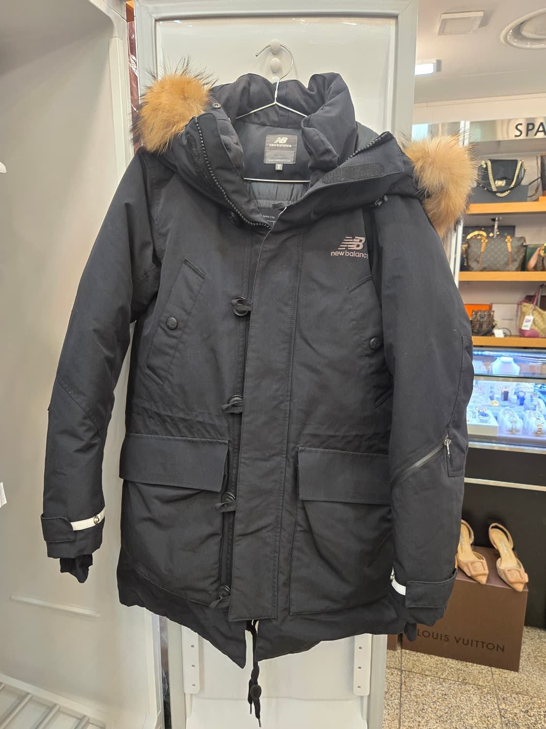 뉴발란스 카메라맨 시티 다운 파카 상품이미지1