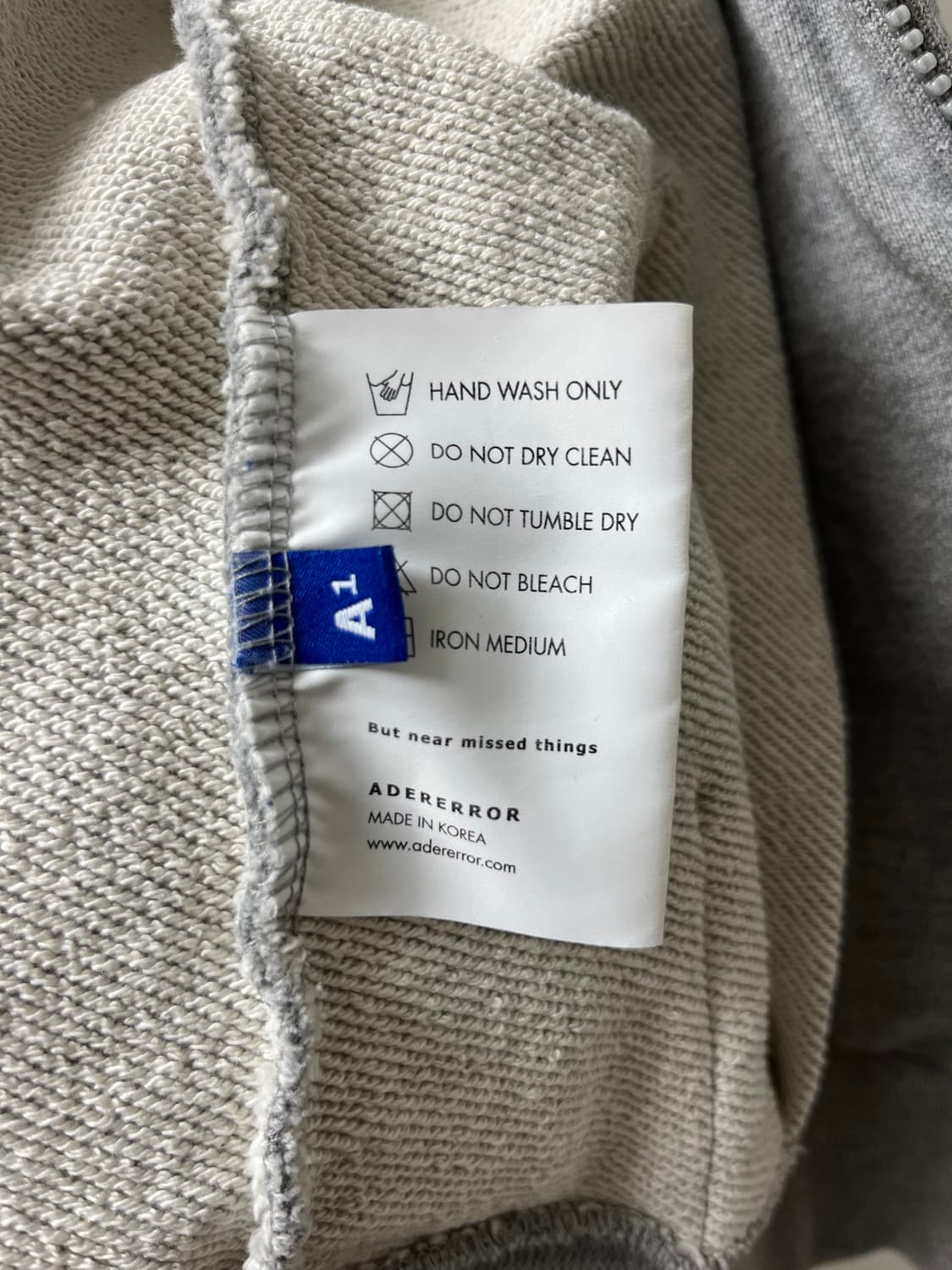 아더에러 시그니피컨트 TRS 태그 후드 집업 A1 사이즈 상품이미지4