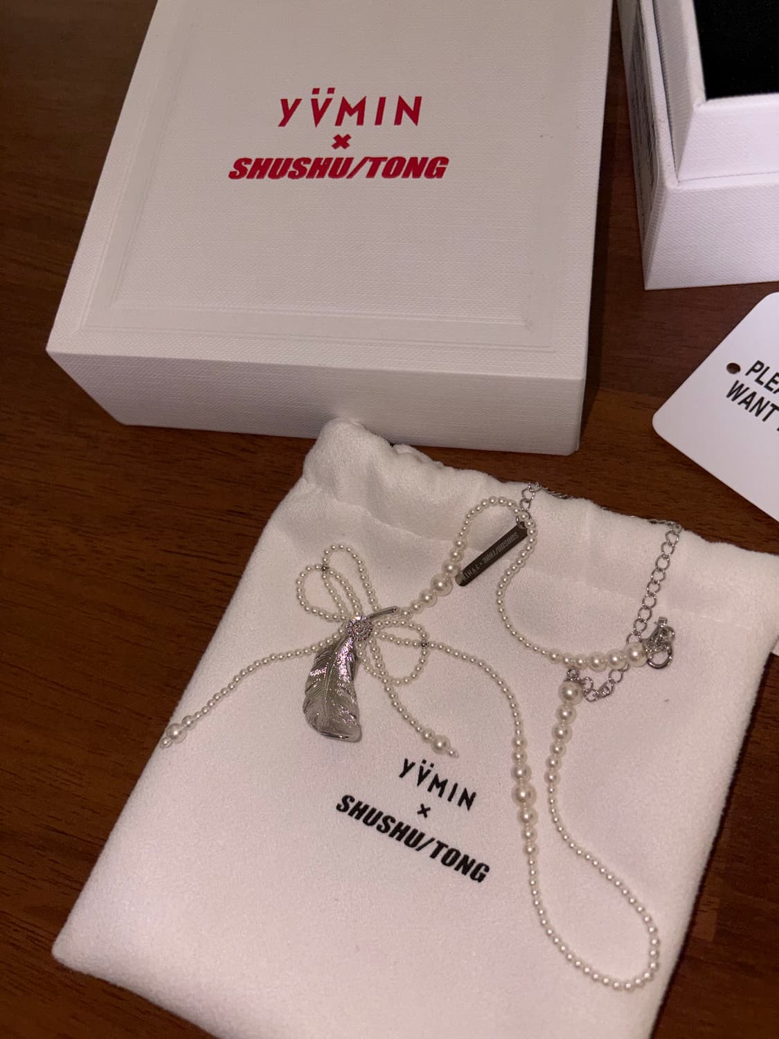 Shushutong 슈슈통 x 위민 콜라보 태슬 페더 목걸이 네크리스 상품이미지1