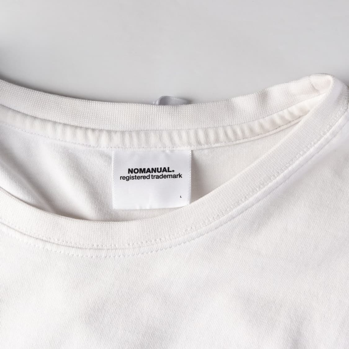 노매뉴얼 백로고 프린팅 화이트 반팔티 L 상품이미지5