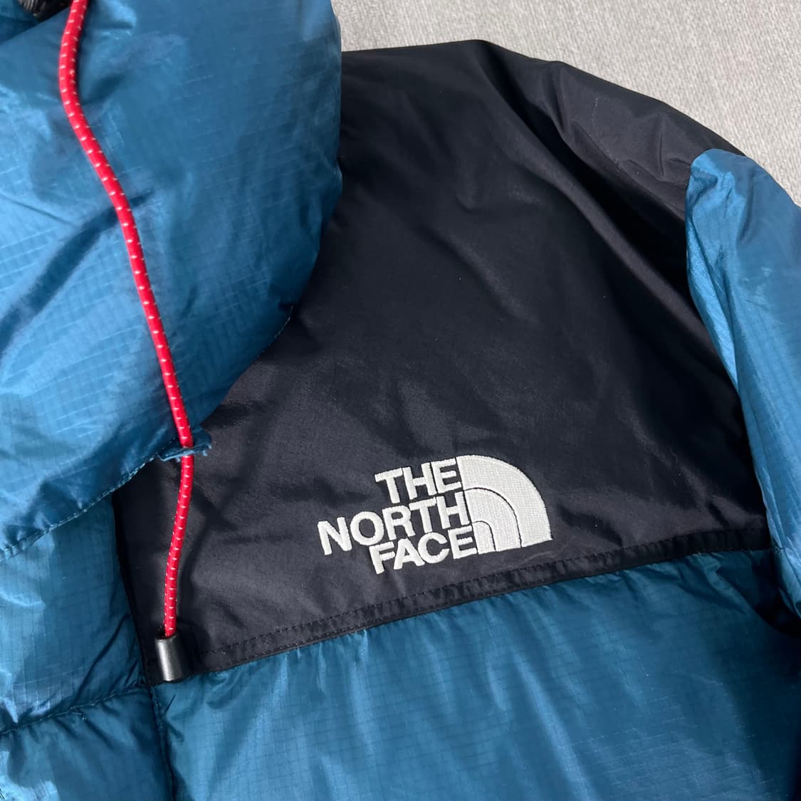 100 노스페이스 서밋시리즈 윈드스토퍼 700 드롭 블루 패딩 상품이미지2