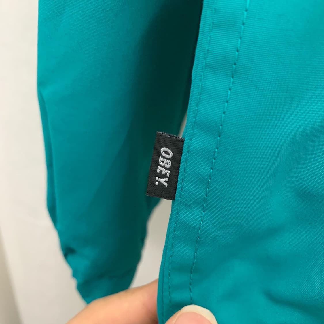 오베이 블루그린 백프린팅 윈드브레이커 상품이미지5