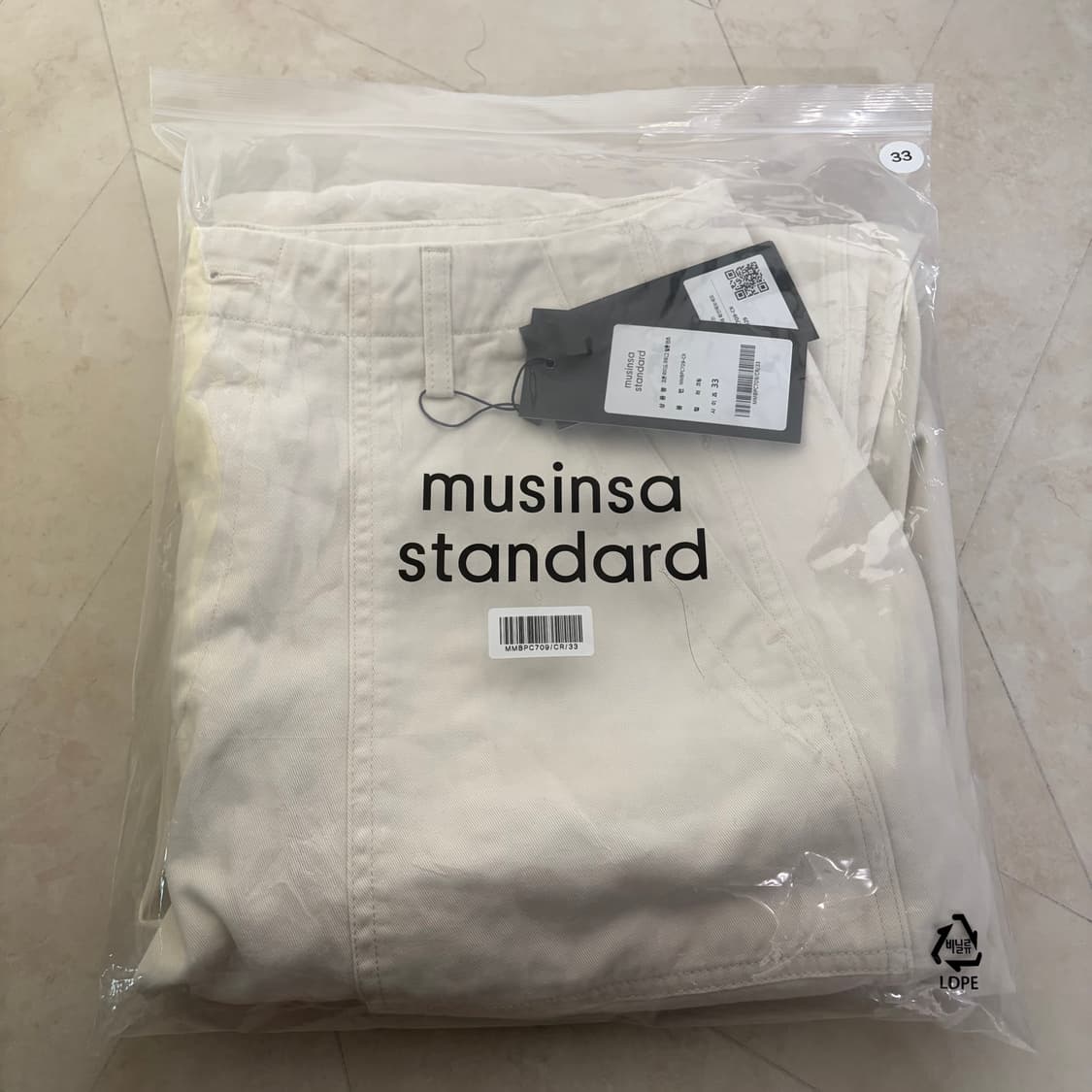 새상품(33)무신사스탠다드 코튼 와이드 퍼티그 벌룬팬츠 크림 상품이미지1