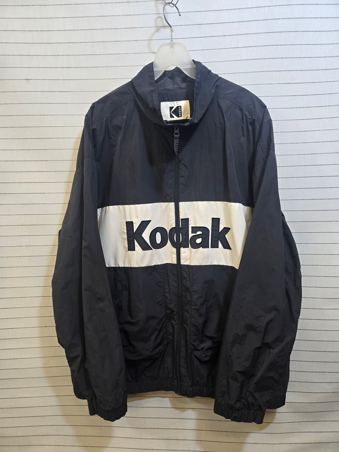 코닥 우븐 블랙 빅로고 짚업자컷 상품이미지1