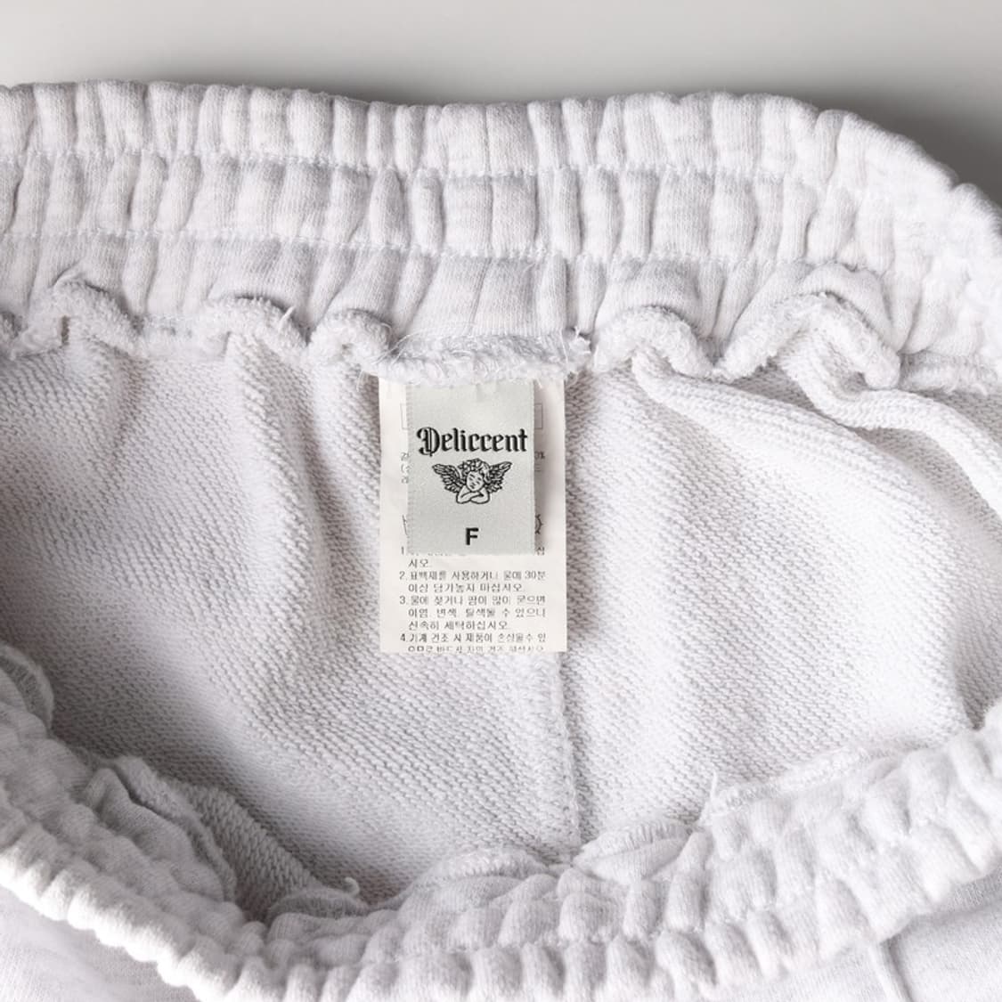 델리센트 로고 자수 밴딩 롱 스커트  상품이미지6