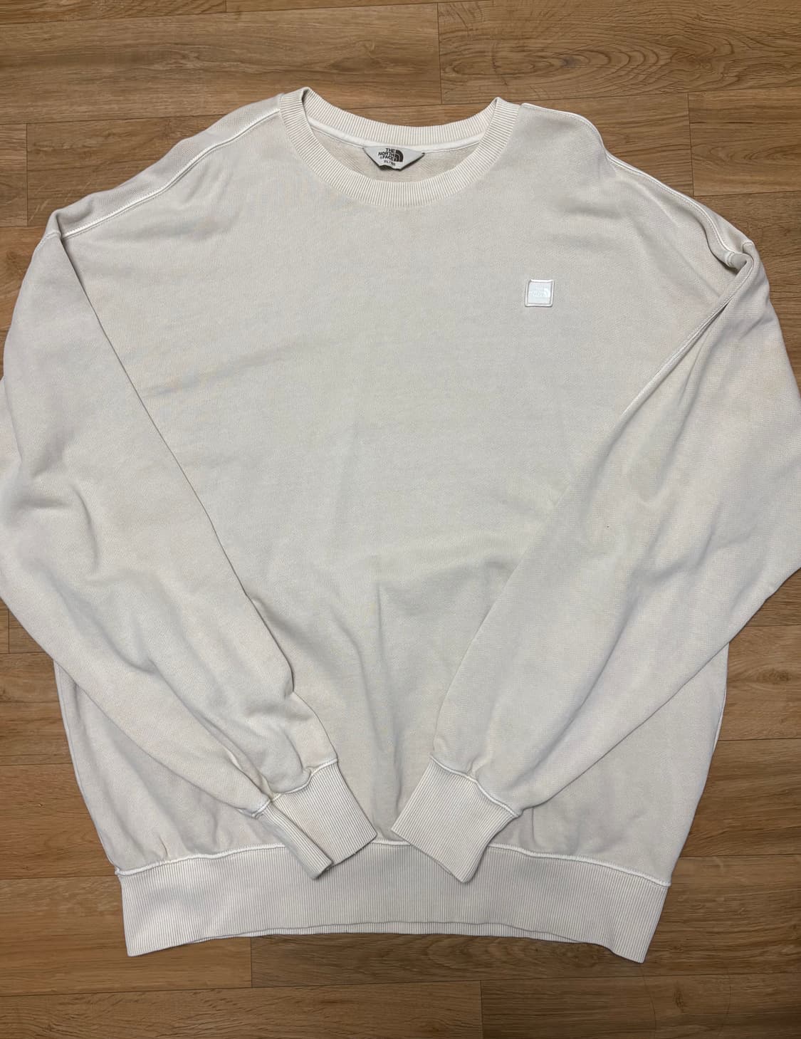 노스페이스 맨투맨 아이보리 상품이미지1