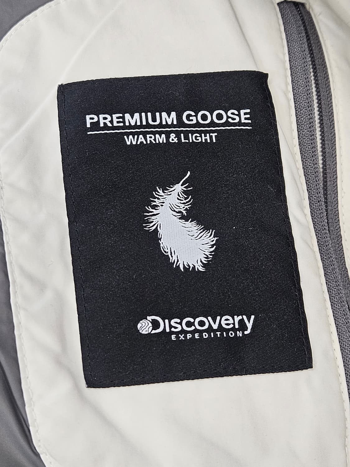 디스커버리(Discovery) 구스 롱패딩 아이보리  상품이미지7