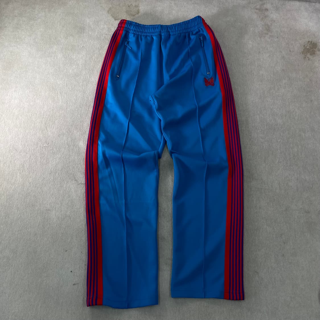 34 니들스 네로우핏 블루 트랙팬츠 상품이미지1