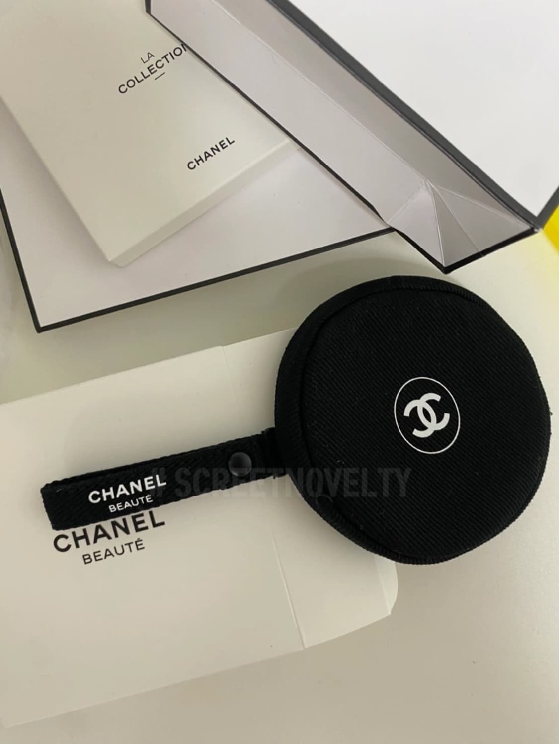 샤넬뷰티  블랙원형 미니파우치 동전지갑 스트랩  상품이미지6