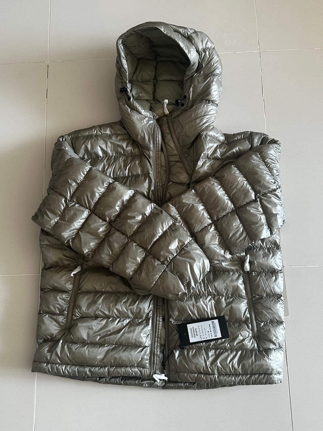 무신사 스탠다드 탱크 라이트 벤트 경량패딩 상품이미지1