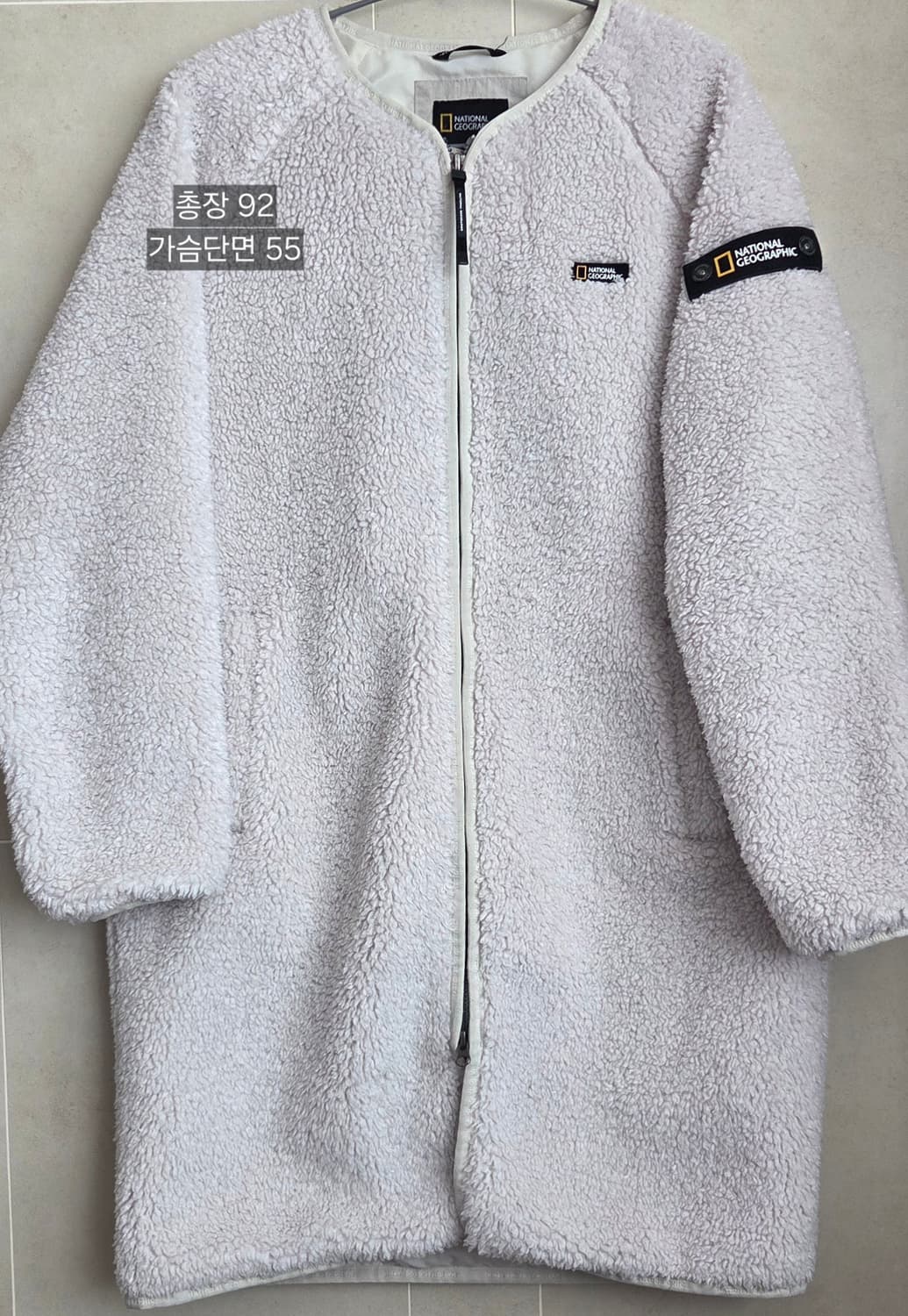 내셔널지오그래픽 뽀글이 롱코트 85(XS) 아이보리
택포 상품이미지1