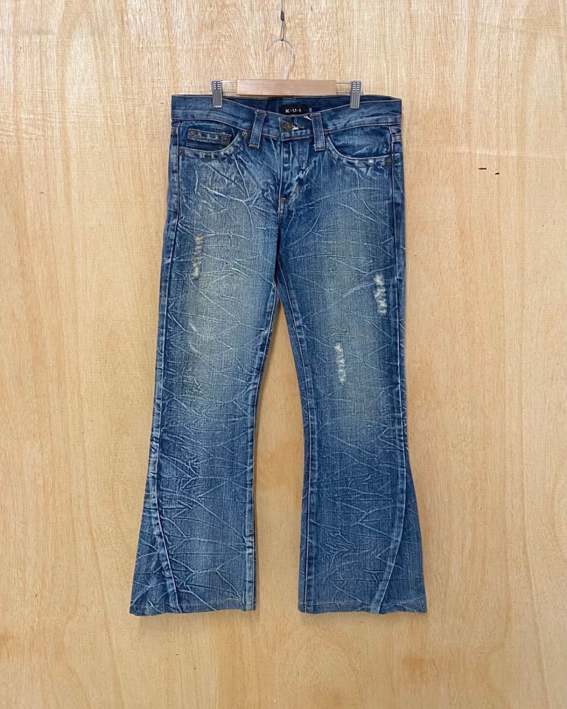 K.U.I 하드워싱 커브드 절개 부츠컷 상품이미지1