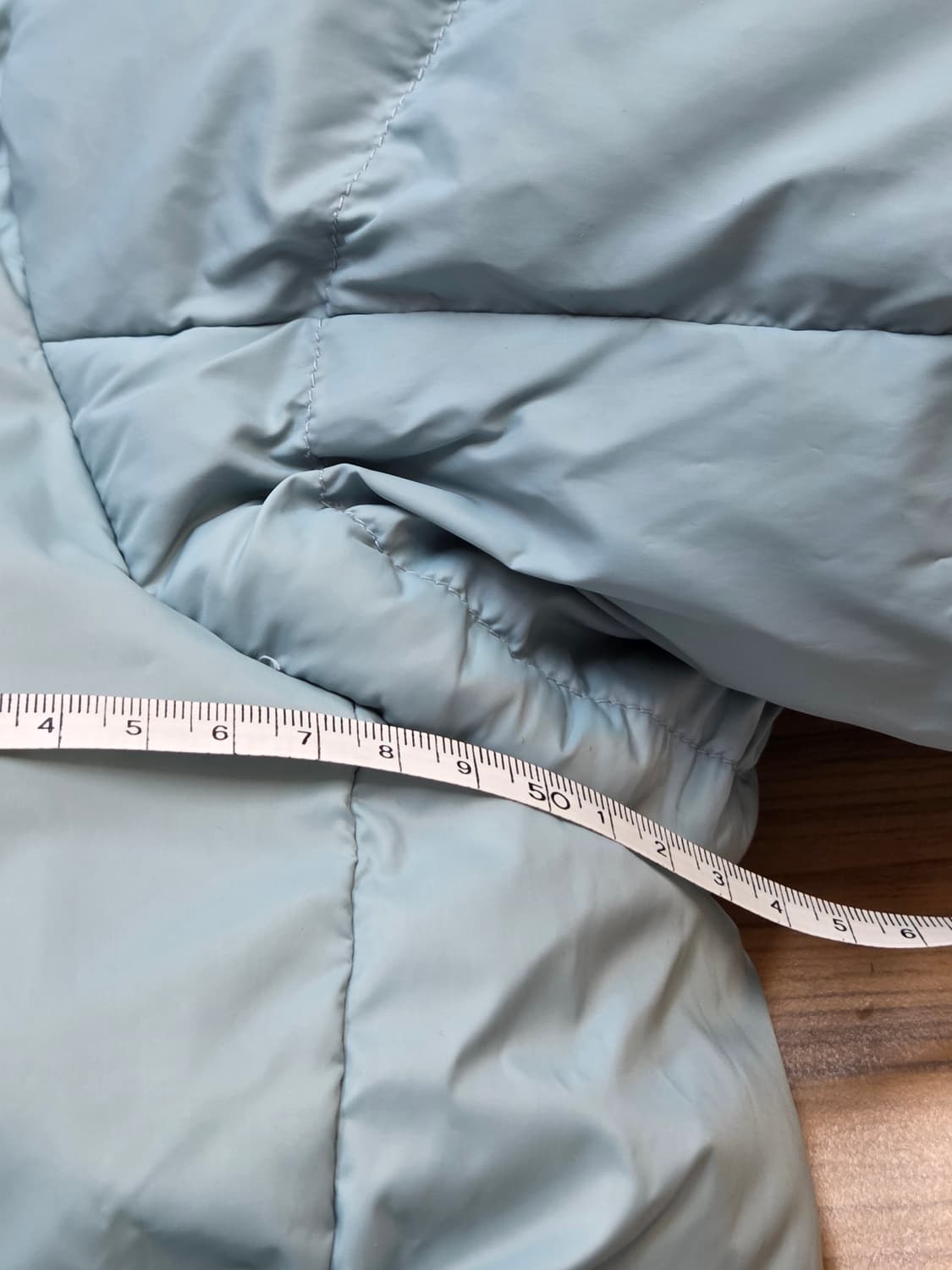 블랙야크 주니어 리버시블 다운 자켓입니다. 사이즈는 155이고, 안쪽에  상품이미지6