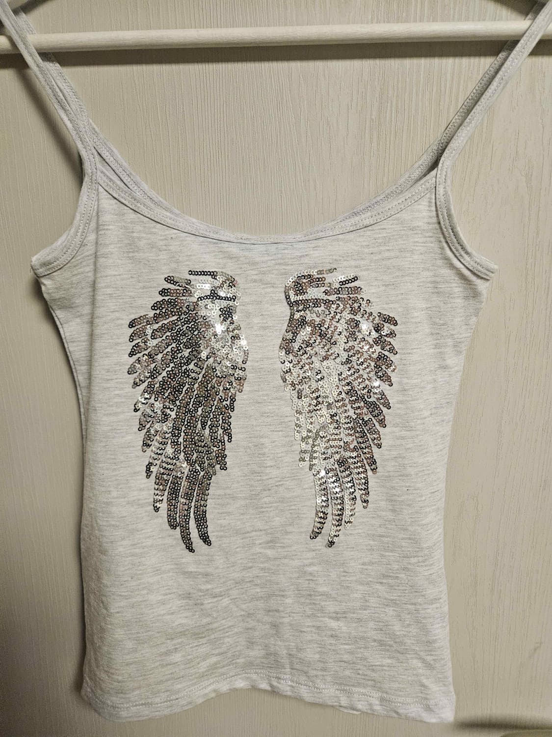 Subdued winged tank top 상품이미지1