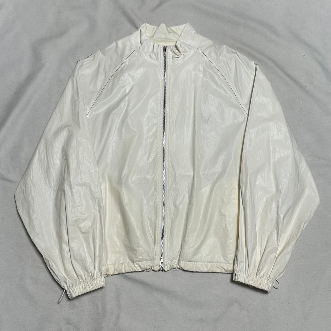 F 마뗑킴 로고 코팅 화이트 바람막이 상품이미지3