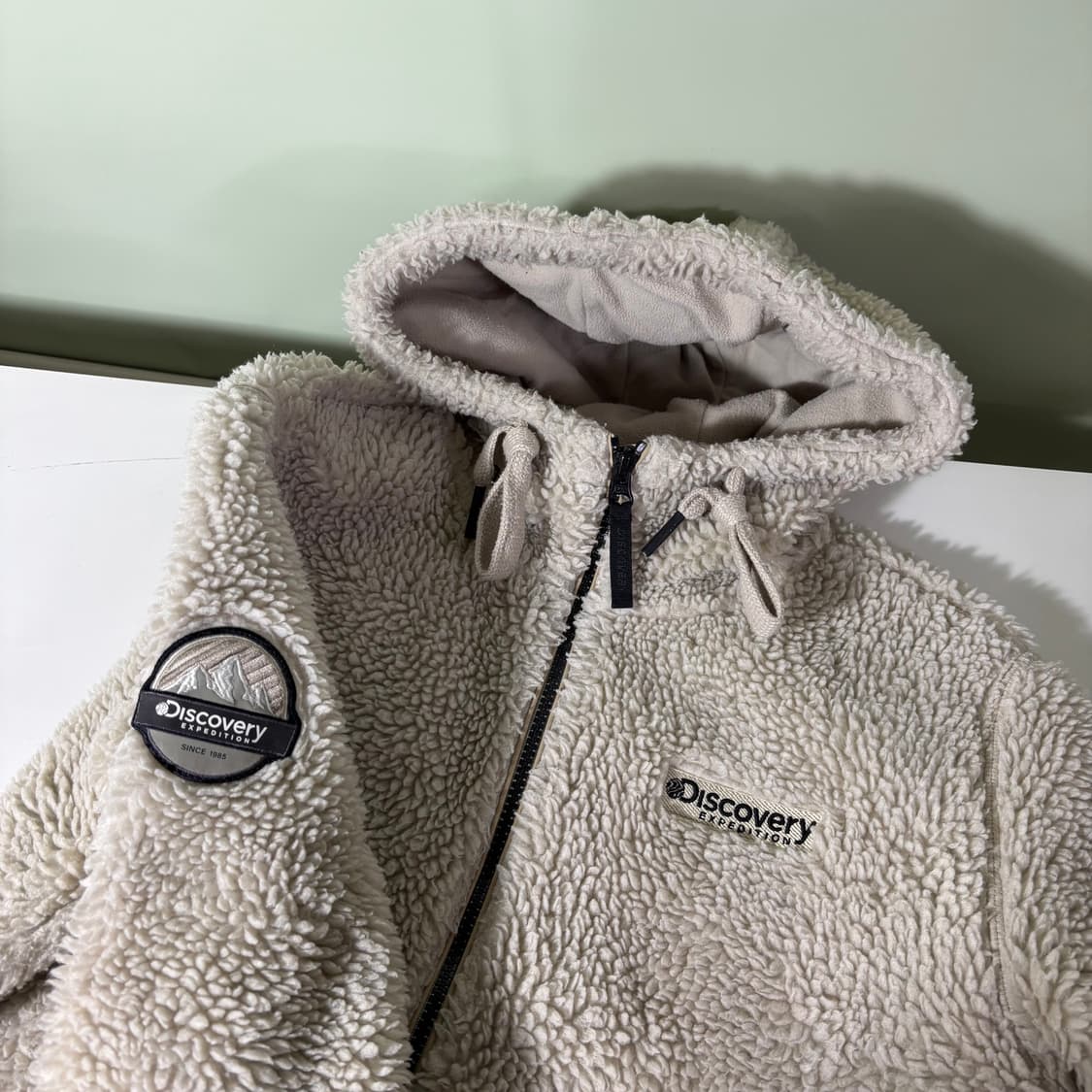 95 S-M 디스커버리 아이보리베이지 기본로고 후드 플리스자켓 상품이미지1