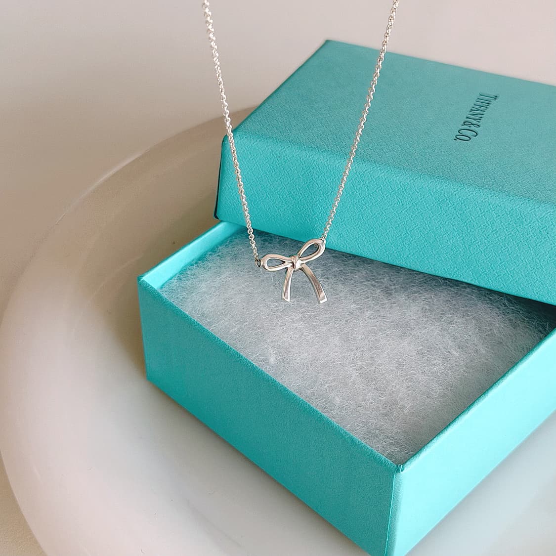 티파니 앤코 신슬기 리본 목걸이 상품이미지1