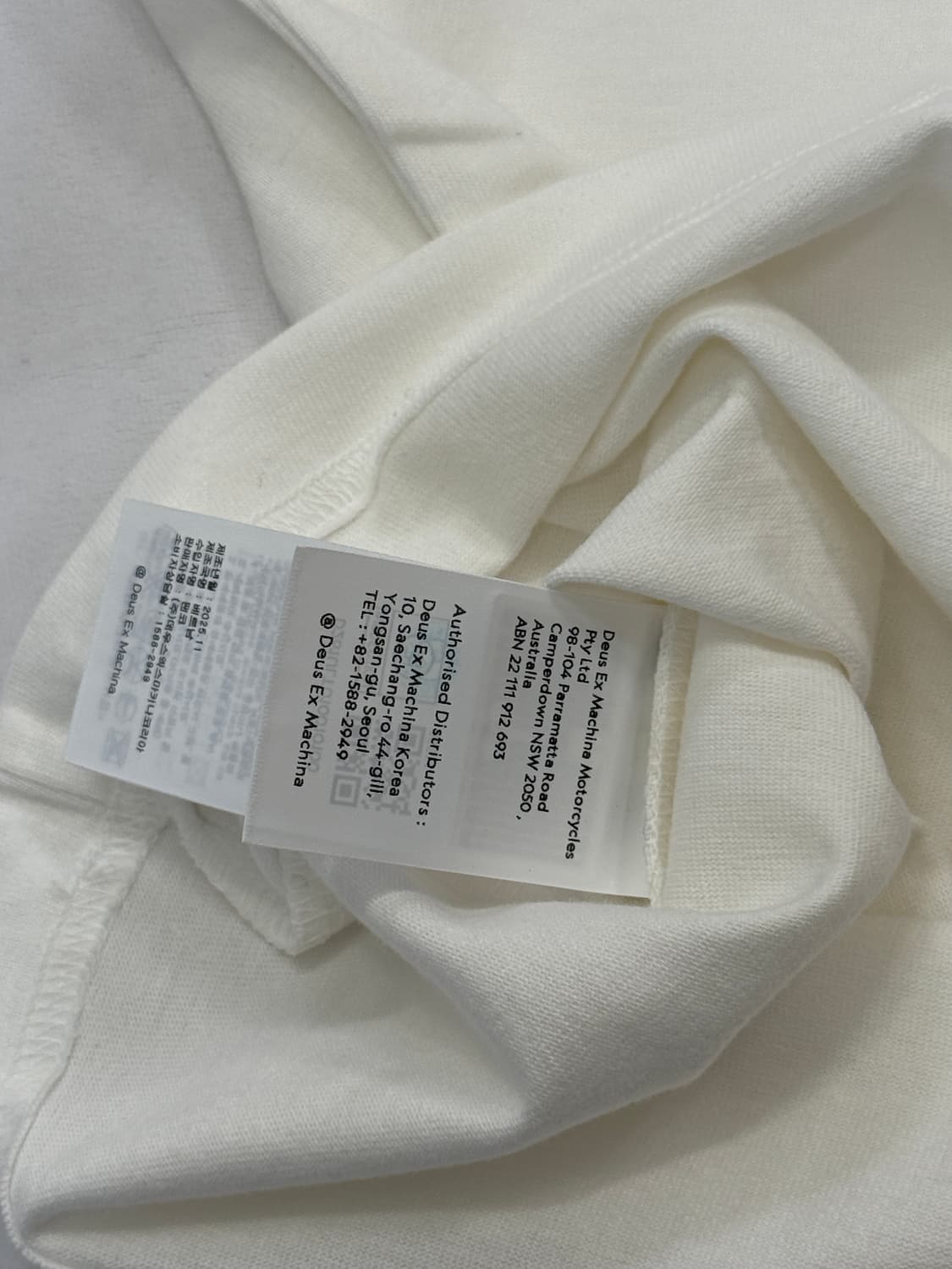 [새상품]Deus데우스 서울 컬리지 긴팔 롱슬리브 티셔츠 흰색 새상품 L 상품이미지7