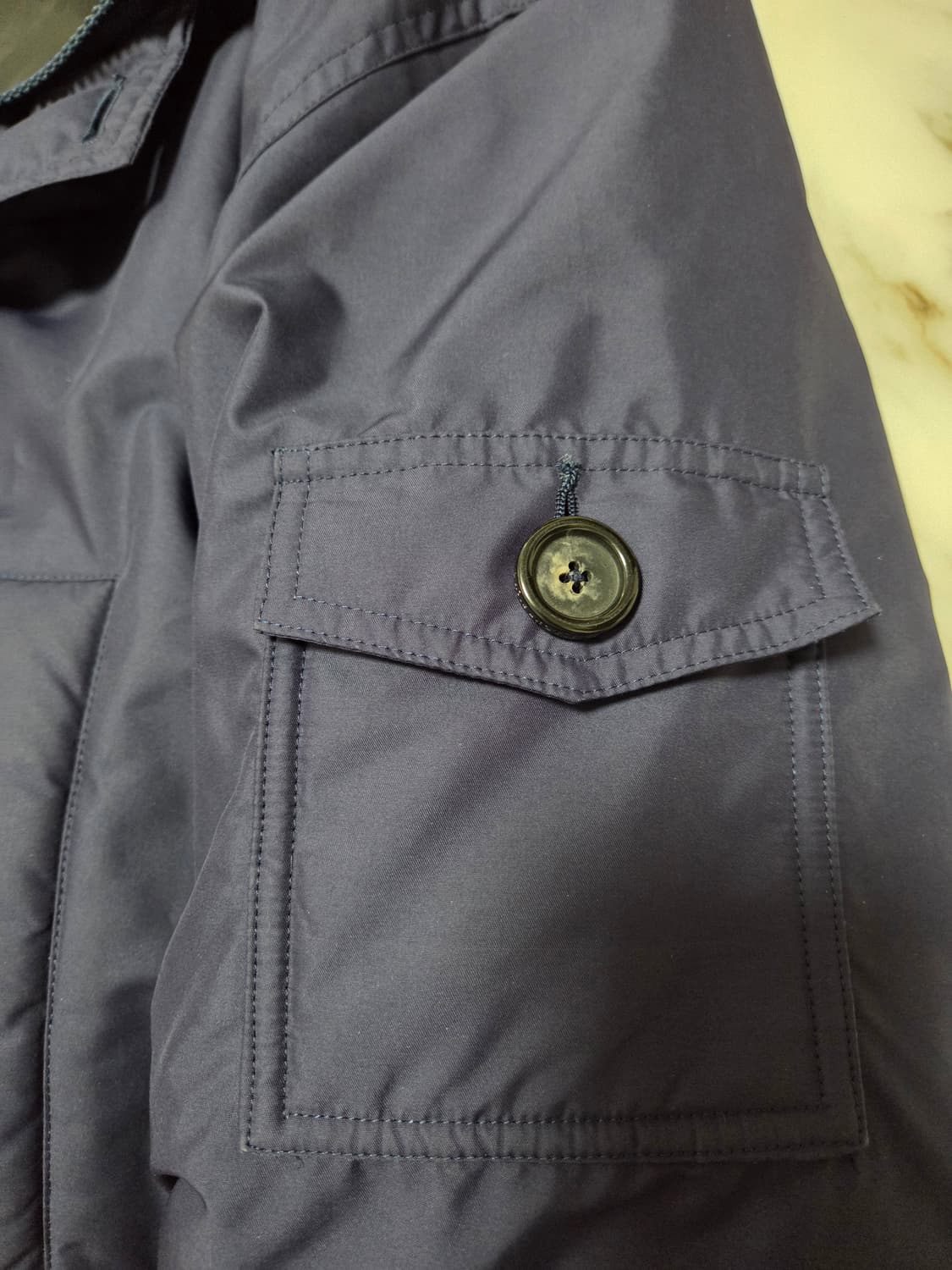 오니츠카타이거 네입 다운 패딩 상품이미지4