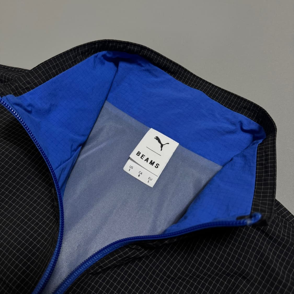 빔즈 X 퓨마(PUMA) 19fw 블랙 블루 립스톱 하이넥 윈드브레이커 상품이미지3