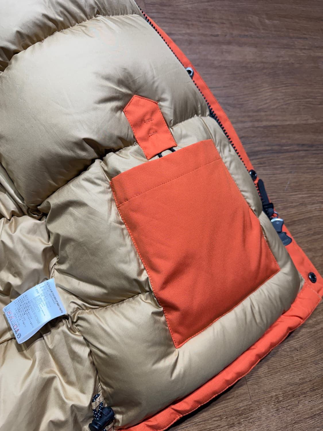 [L]뉴발란스 카메라맨 오렌지 패딩(상태 A급) 상품이미지5