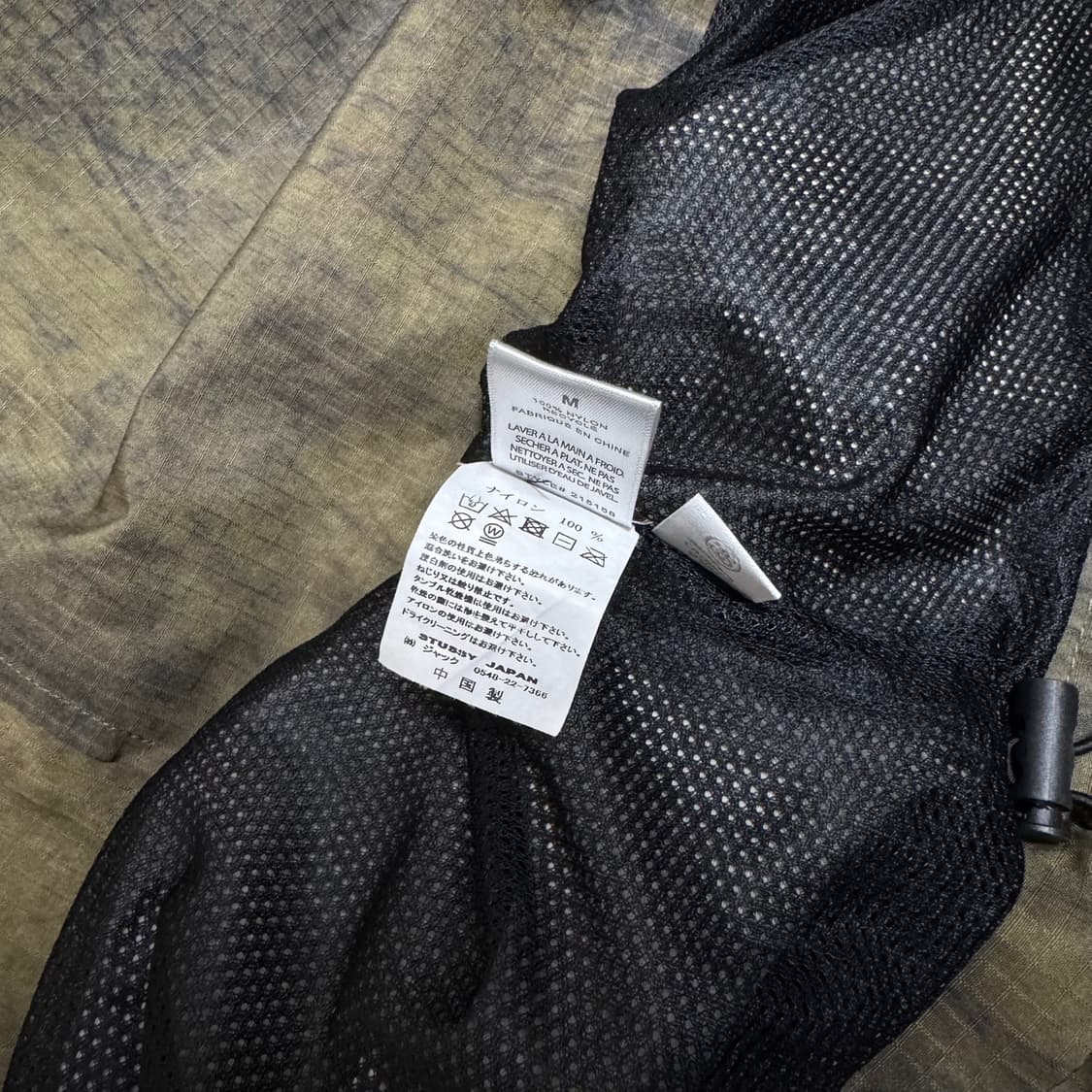 스투시(STUSSY) 카키컬러 리사이클 폴리 카모쿼터 집업 풀오버 자켓 상품이미지7