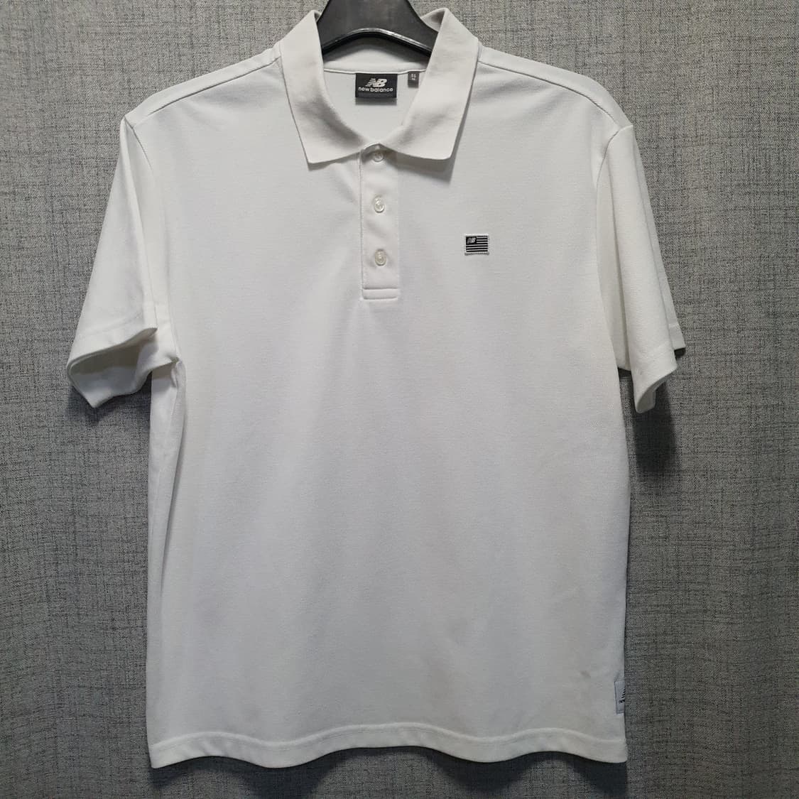 뉴발란스 화이트 폴로 반팔티  상품이미지1