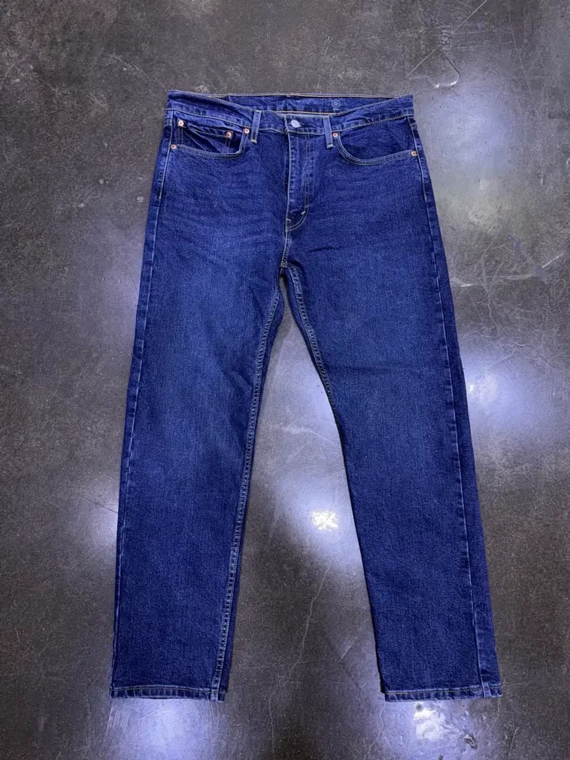 리바이스 502 테이퍼드핏 중청 워싱 웜 약기모 데님팬츠 36 상품이미지1