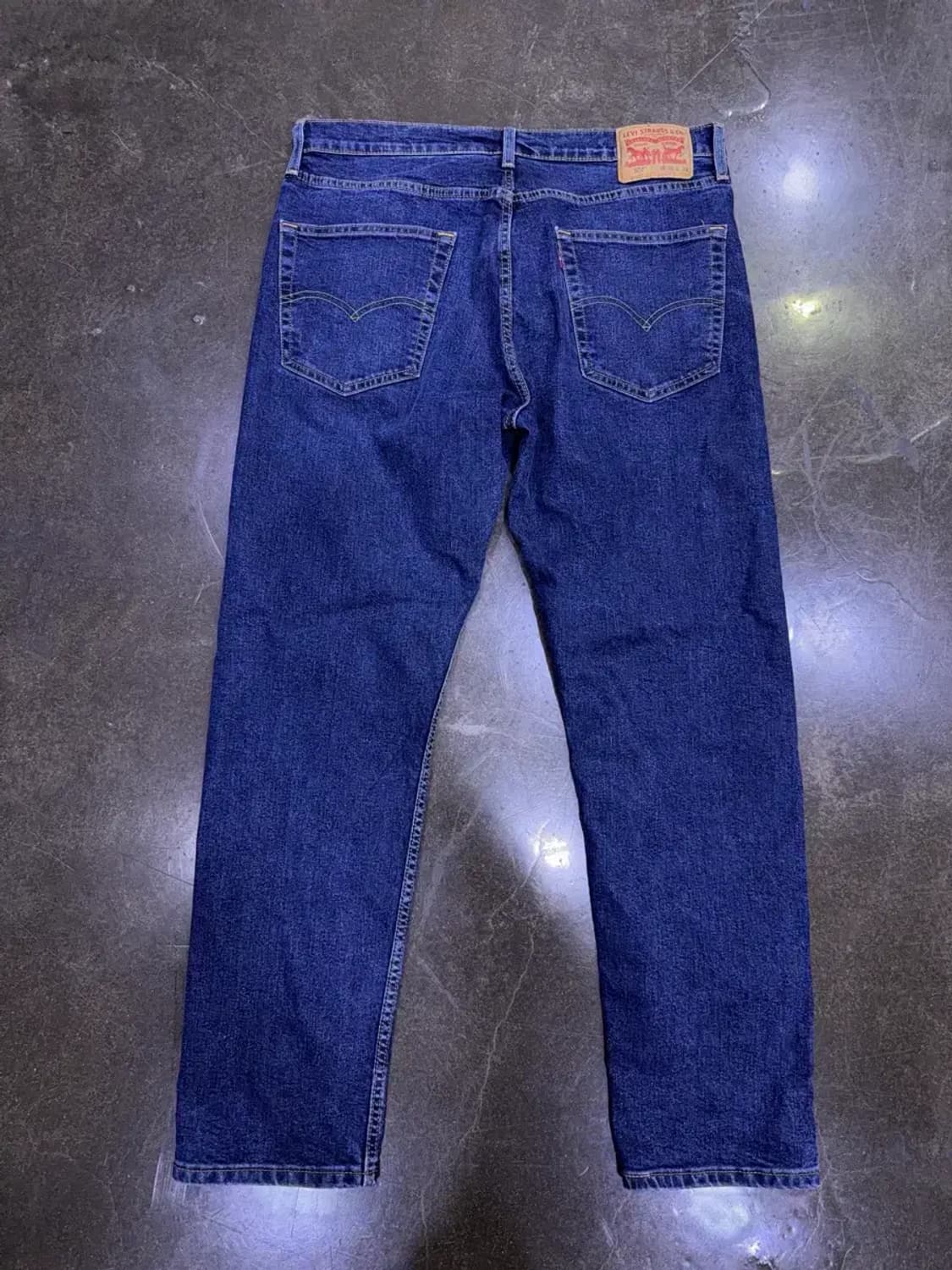 리바이스 502 테이퍼드핏 중청 워싱 웜 약기모 데님팬츠 36 상품이미지2