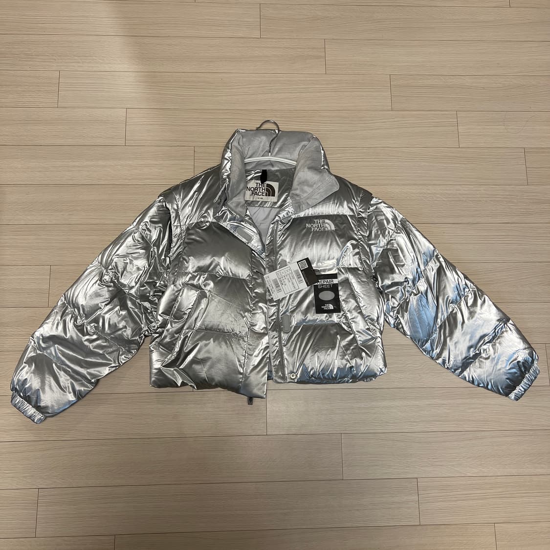 노스페이스 화이트라벨 글로시패딩 상품이미지1
