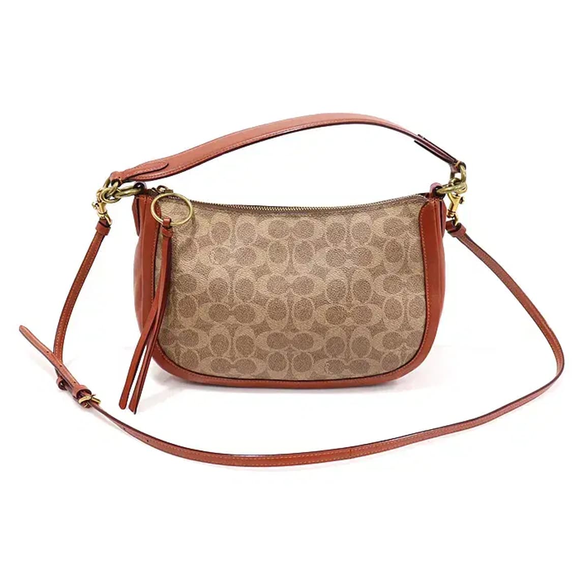 코치 52577 탠 러스트 캔버스 서튼 크로스바디 CO16414CO 상품이미지1