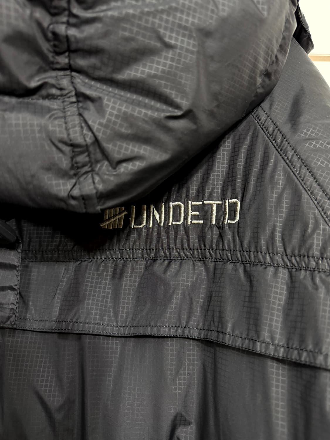 UNDEFEATED 다운점퍼 상품이미지7