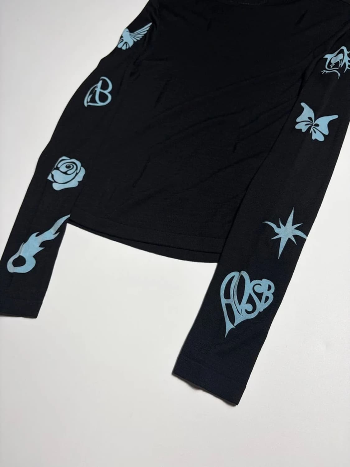 앤더슨벨 23SS 아우겐 플로킹 이너 니트 탑 R1890 상품이미지4
