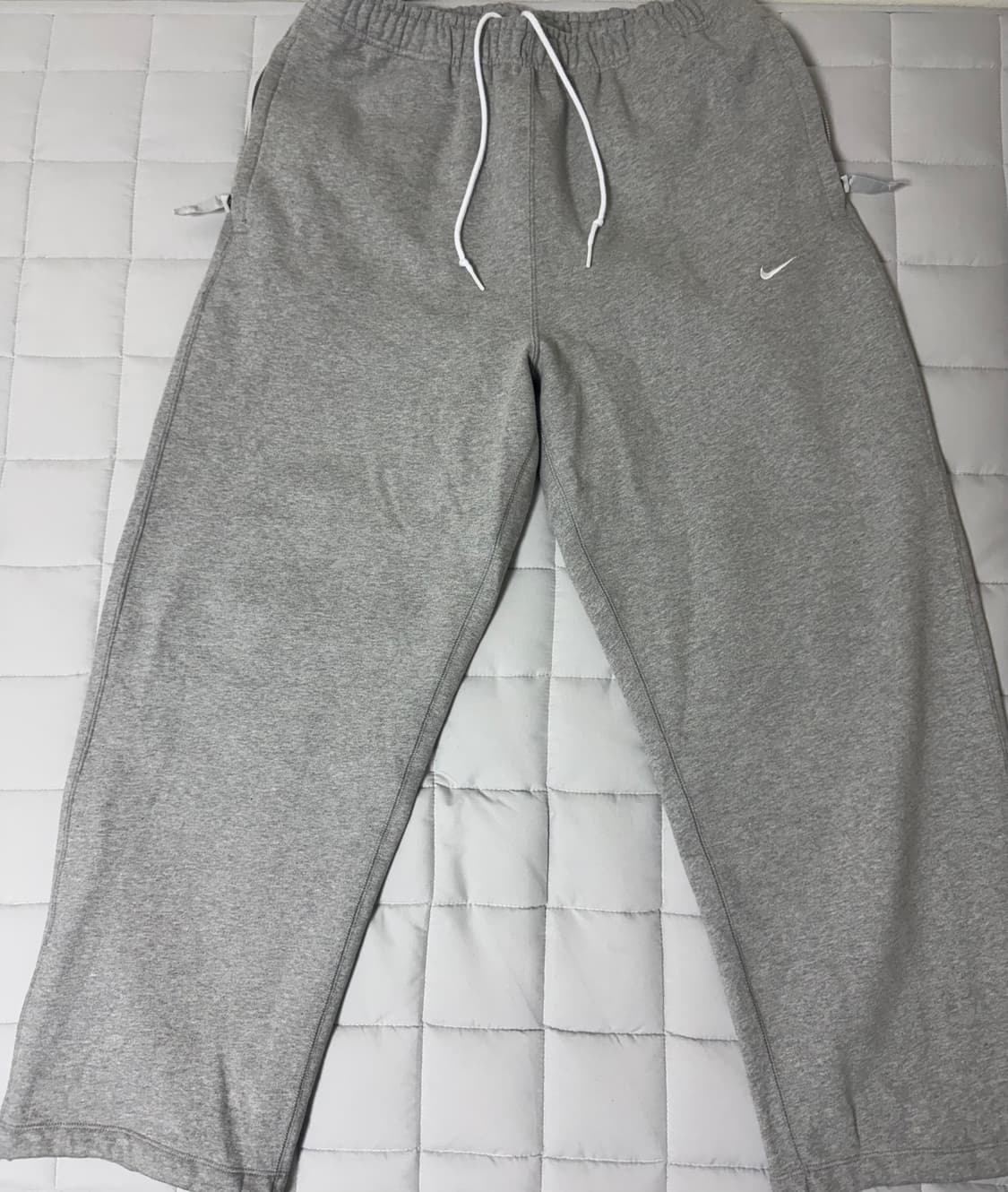 스포츠웨어 스우시 오픈 헴 플리스 팬츠 상품이미지1