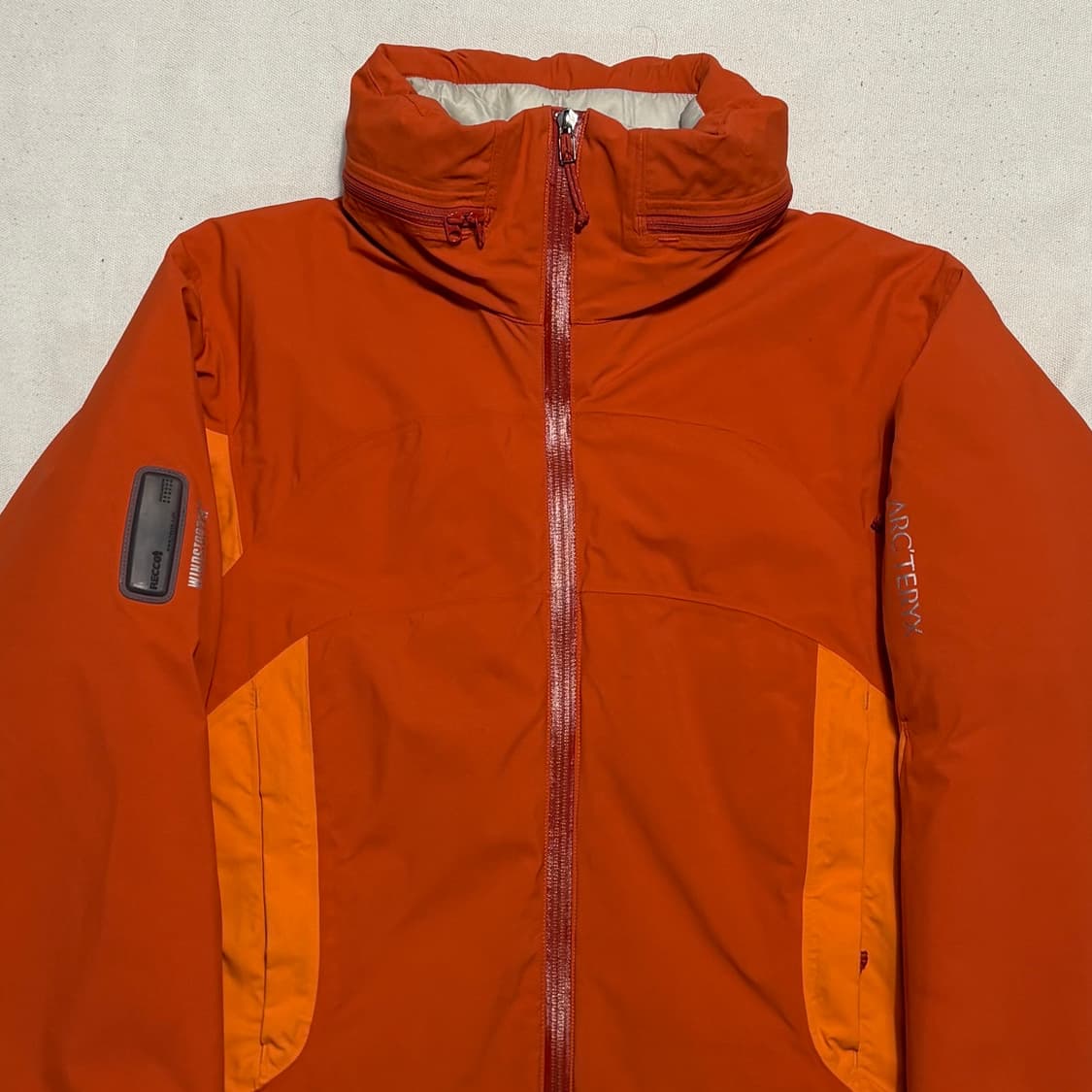M 아크테릭스 여성용 윈드스토퍼 내장후드 오렌지 아톰 자켓 상품이미지1