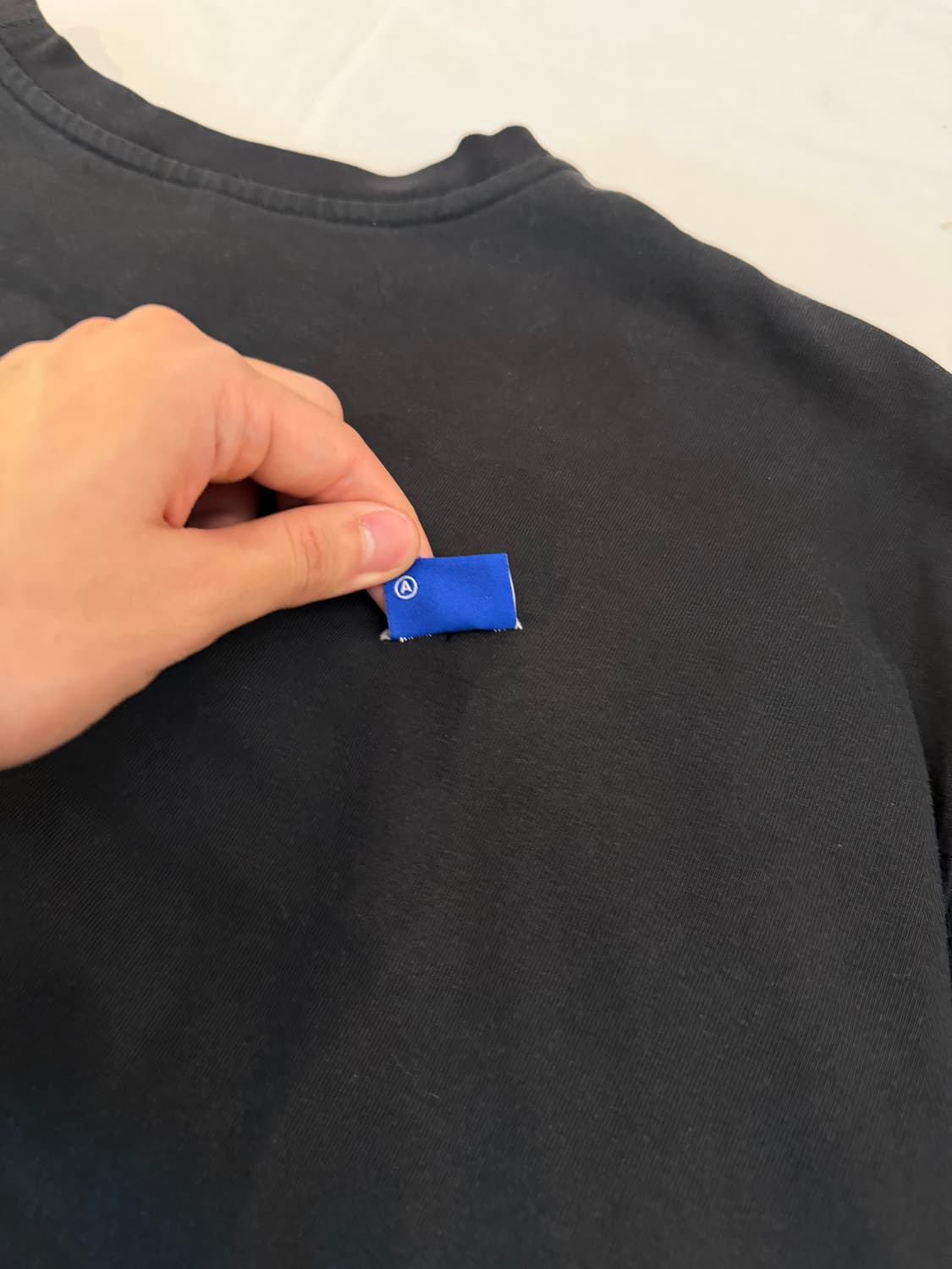 아더에러 21ss 테이프 로고 시그니쳐 라벨 롱슬리브 블랙 상품이미지5