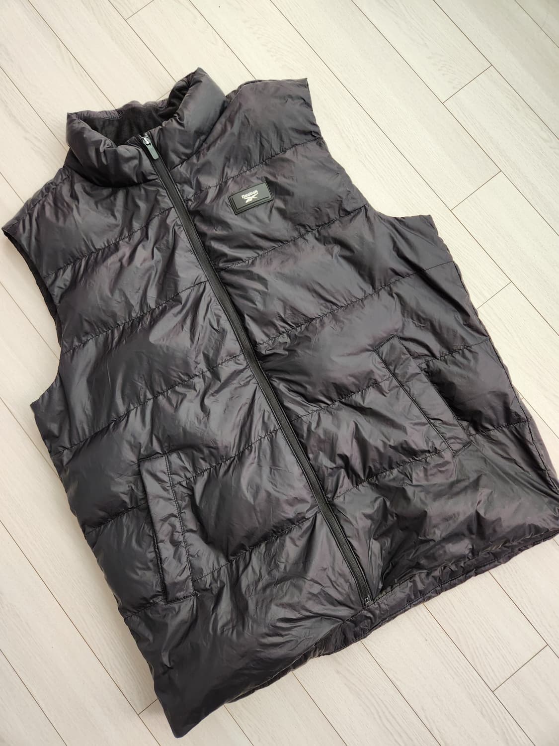 새상품급)리복 블랙 패딩조끼 HS M VEST사이즈110 상품이미지1