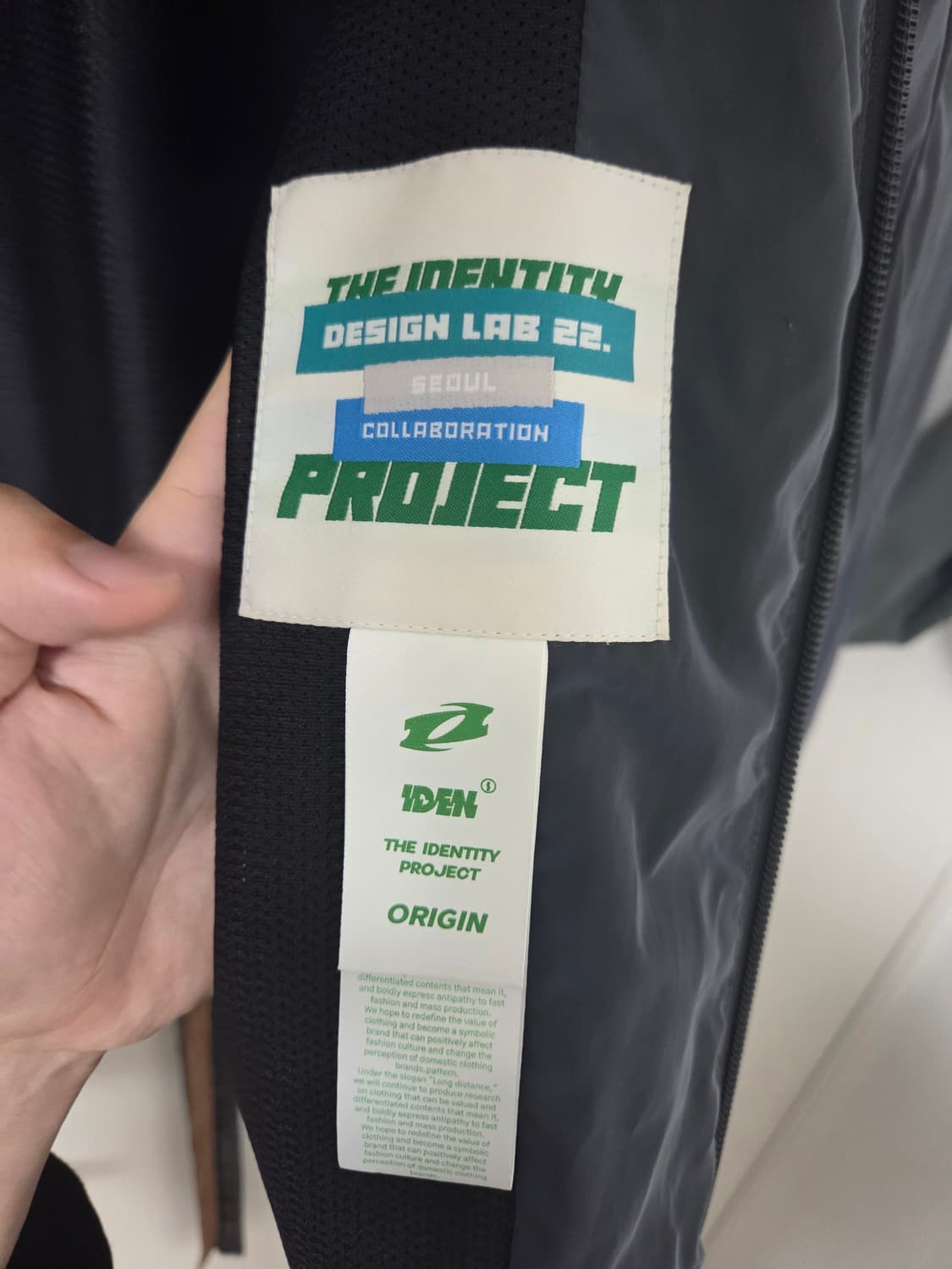 더 아이덴티티 프로젝트 curve string anorak jumper 상품이미지3