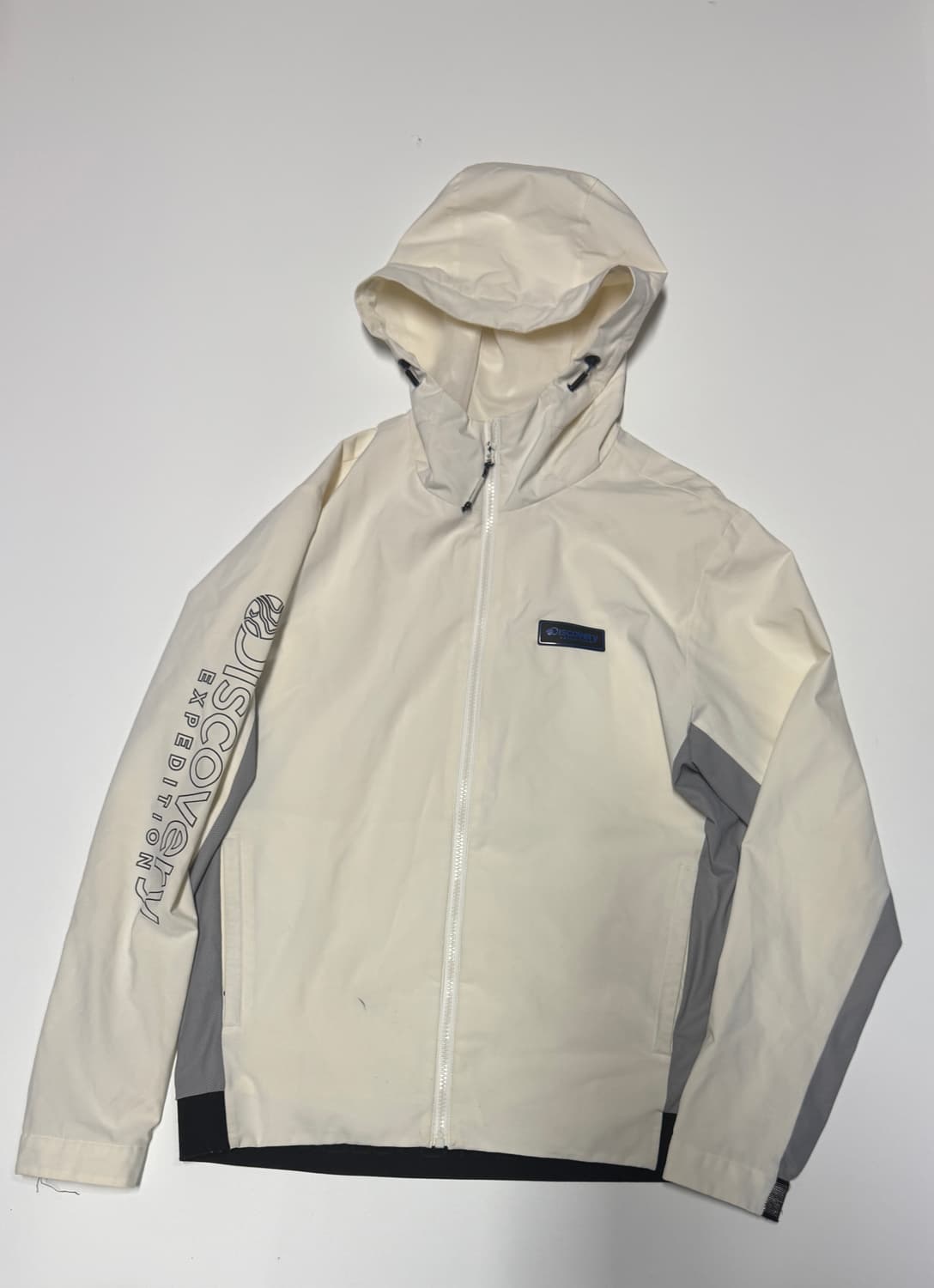 디스커버리 익스페디션 사이드 스펠로고 바람막이 L 상품이미지1