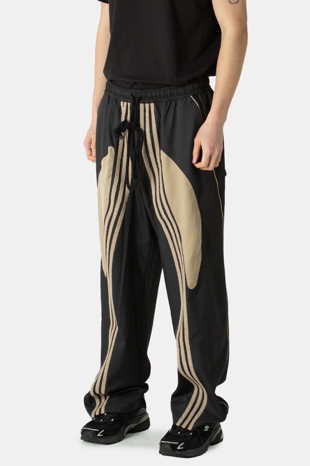 아디다스 송포더뮤트 우븐팬츠 상품이미지1