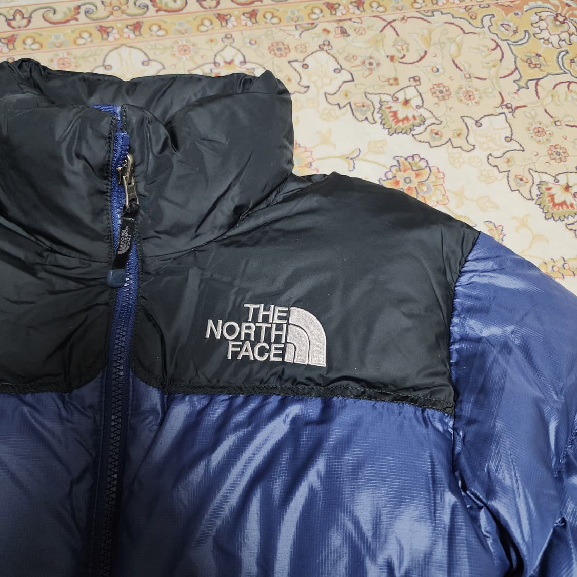 노스페이스 구스다운 눕시 700 여성 패딩
XS 상품이미지4