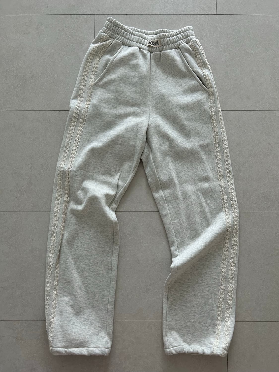 락케이크 레이스 라인 투웨이 조거 팬츠 오트밀  상품이미지1