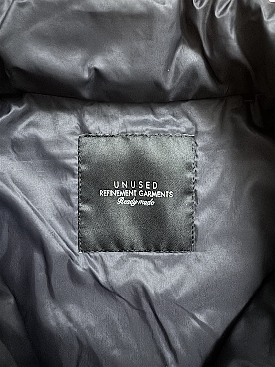 언유즈드 폴라텍 코치 다운 자켓 상품이미지6