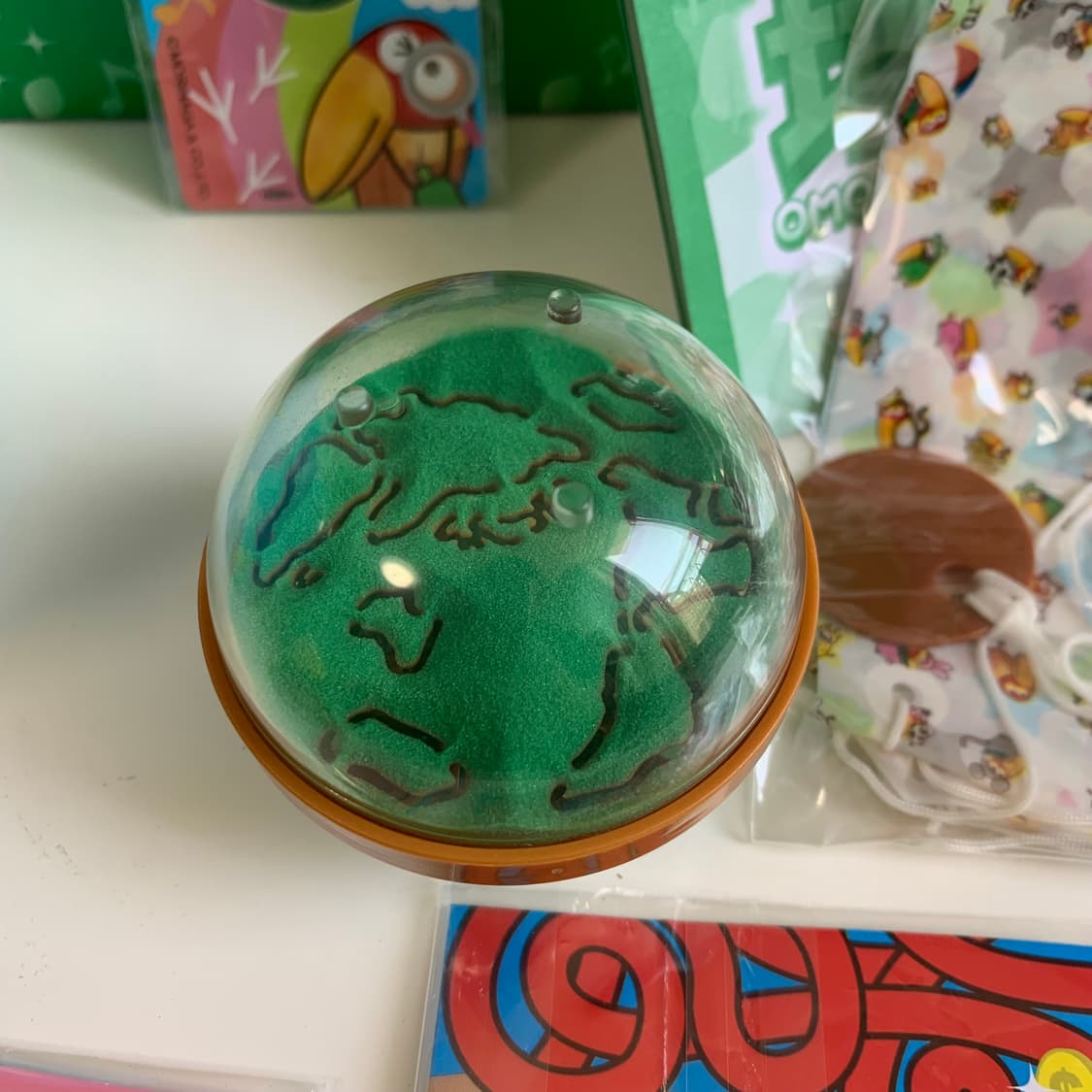 🦜쿄로짱 초코볼 틴케이스 지구모양 상품이미지5